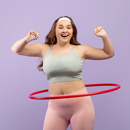 Frau macht Hula Hoop Frau macht Hula Hoop