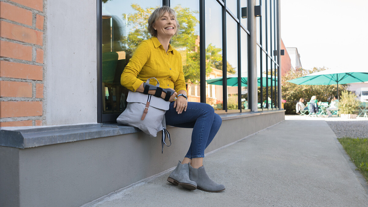 A woman is wearing a wrist brace A woman is wearing a wrist brace