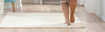 A woman is wearing a Juzo Ulcer Pro below the knee to treat a venous leg ulcer