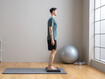 Exercise 1: Standing on one leg on balance cushion with knee bend