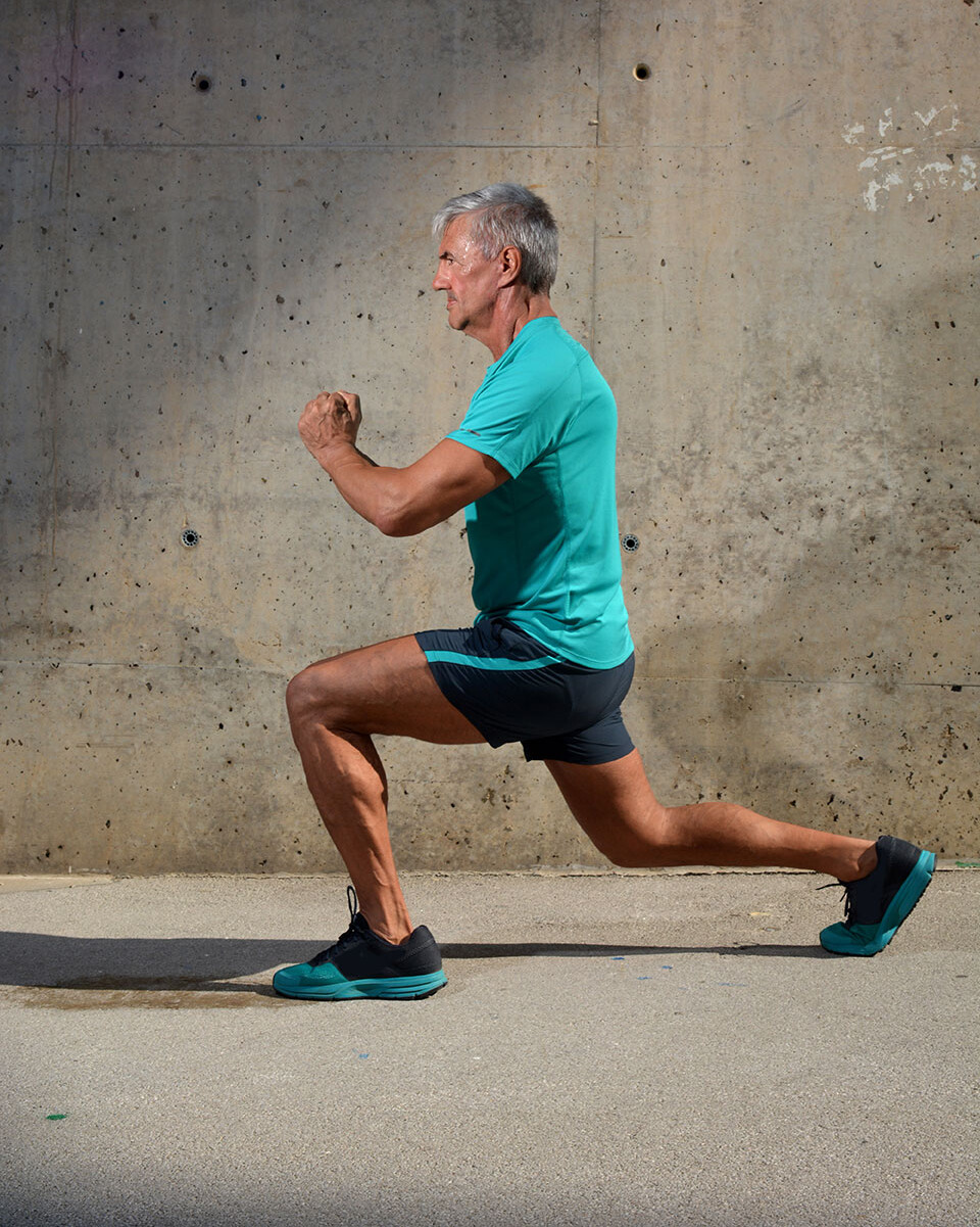 A man is doing lunges A man is doing lunges