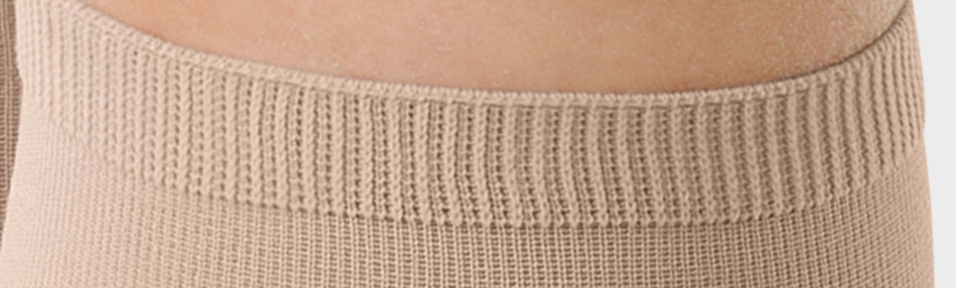 Manchon de compression avec nouvelle bordure