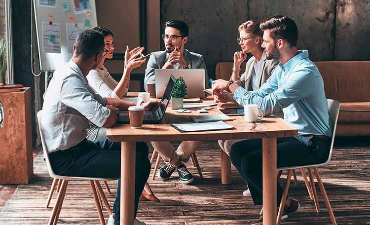 Der Schlüssel zum Erfolg Kollegen im Meeting
