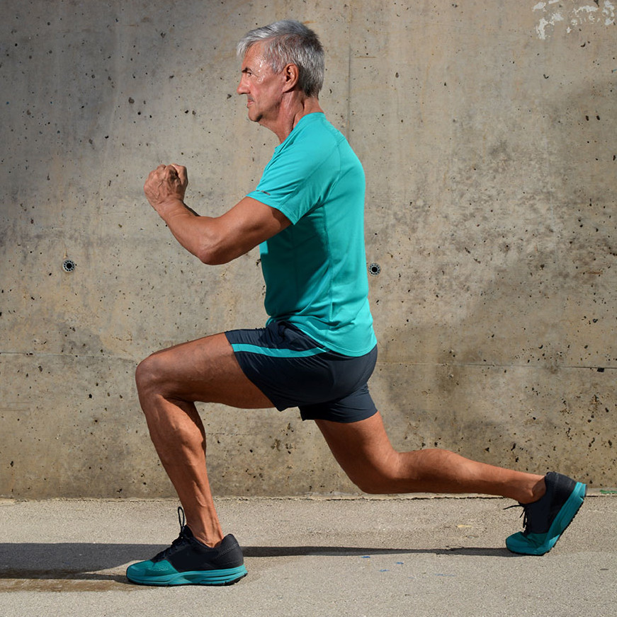 Man doing a lunge Man doing a lunge