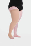 Above-knee compression stocking with silicone border